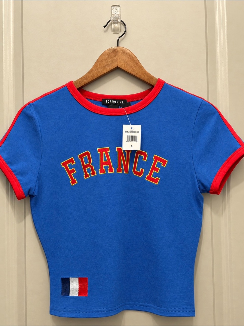 Forever 21 Women’s Blue Crop Tee with Red Trim and France Graphic